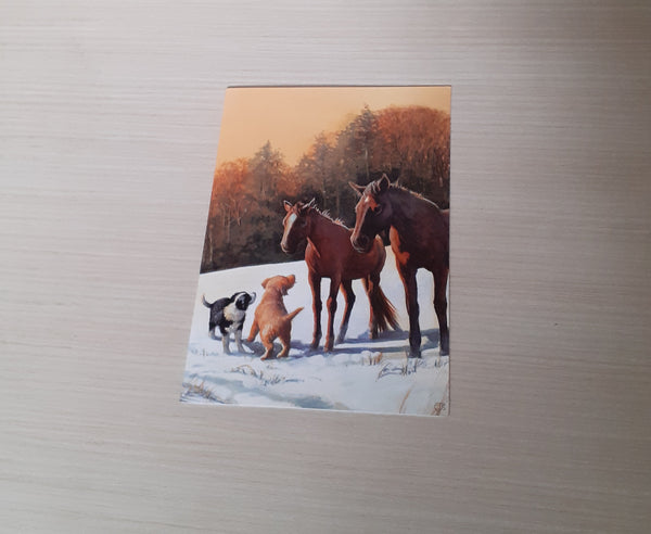 Biglietto di auguri natalizio con cavalli e cani